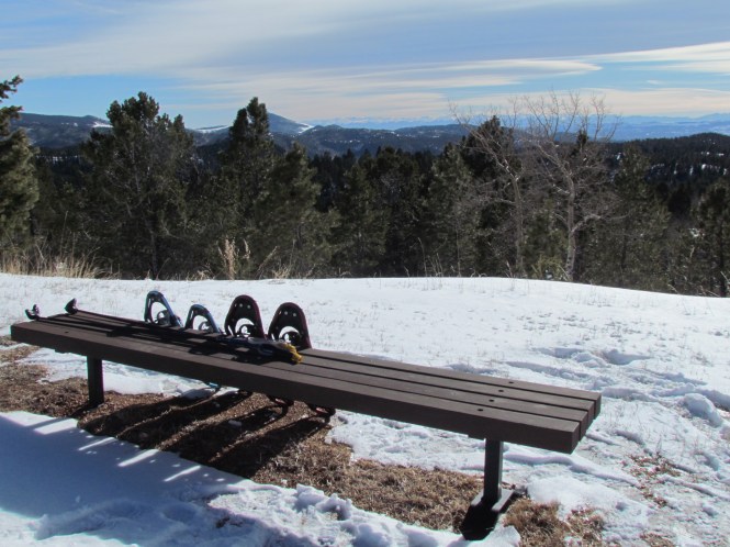 Snowshoeing at Mueller State Park, Colorado, with view of the Western Mountains.